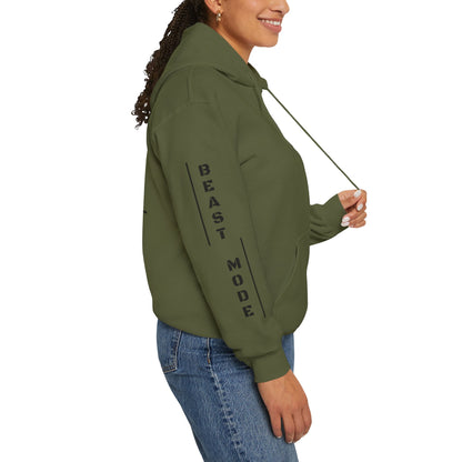 Arm of a hooded sweatshirt. Military green hoodie with the slogan 'Beast Mode' on the back and right arm.