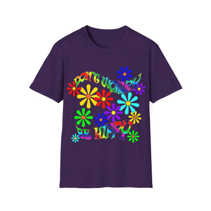 A close-up of a vibrant purple t-shirt with the message "Don't Worry Be Hippy" printed across the chest.